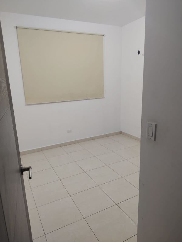 Minimalist bedroom with desk and window in PH Sabana Tower 12 de Octubre Panama