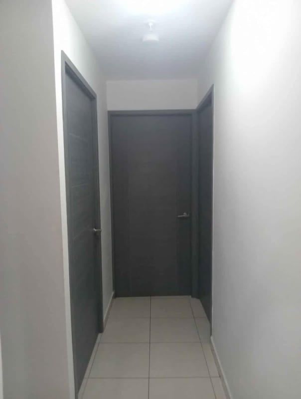 Small furnished bedroom with desk at PH Sabana Tower Panama City
