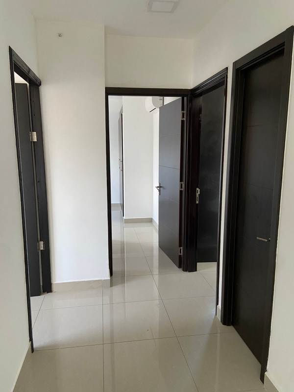 Master bedroom with built-in closet and ceramic tile floor in PH San Francisco Gardens