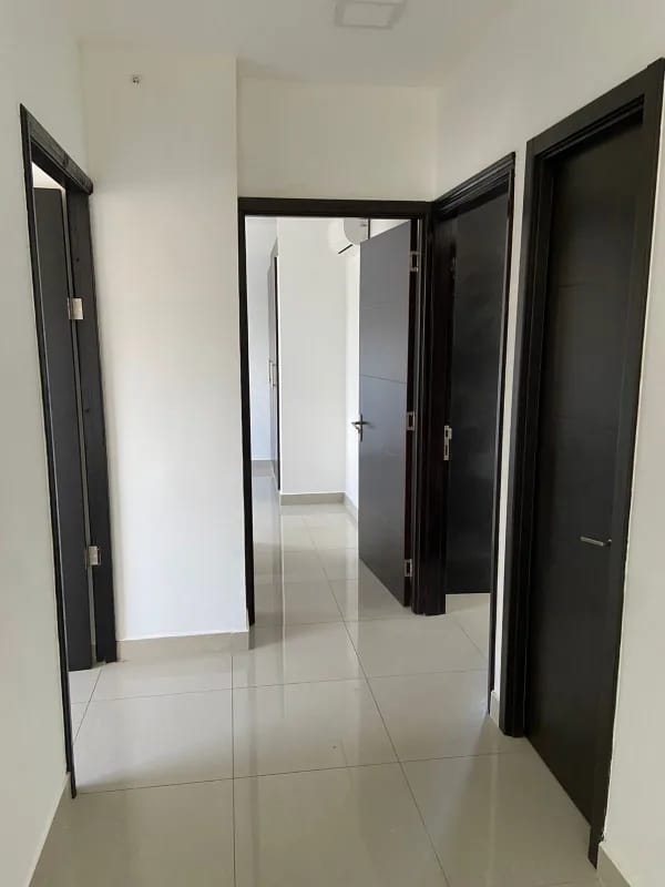 Bright hallway with ceramic floors and multiple doors PH San Francisco Gardens Panama