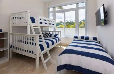 Bright modern living room open plan design in beachfront condo Buenaventura Panama