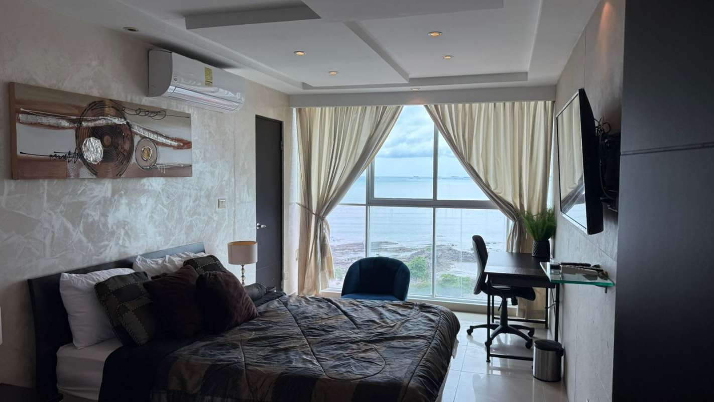 Modern bathroom whirlpool tub rainfall shower elegant decor Ocean Club Panama