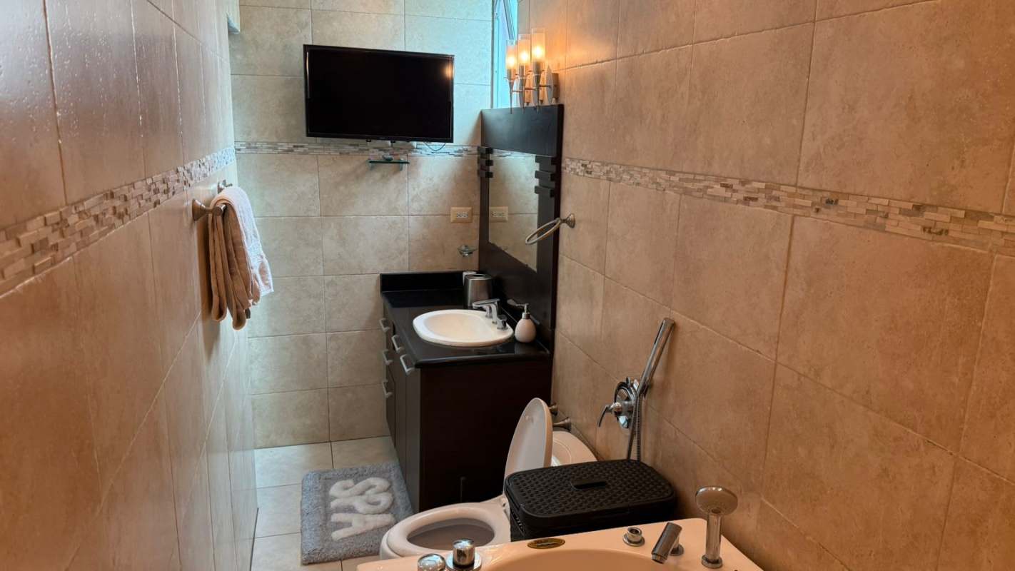 Contemporary interior dining and living with ocean view balcony at The Ocean Club Panama