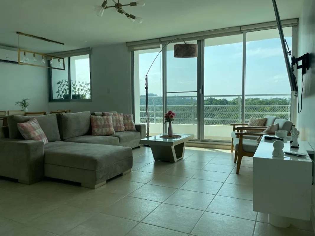 Modern kitchen with granite countertops, built-in fridge and gas stove in furnished apartment Clayton Park 1 Panama