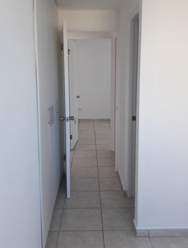 Apartment hallway with built-in closet and tile floor PH Sunshine by The Park Panama
