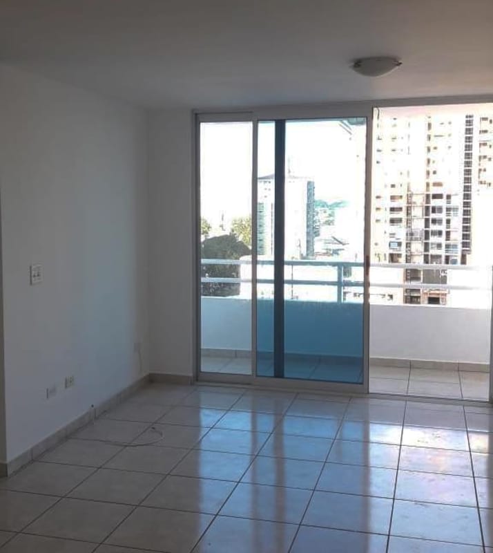 Open living space with ceramic tiles and large balcony doors at PH Sunshine by The Park Panama