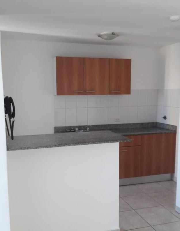 Bright bedroom with built-in closet and tiled floor in PH Sunshine by The Park Panama City