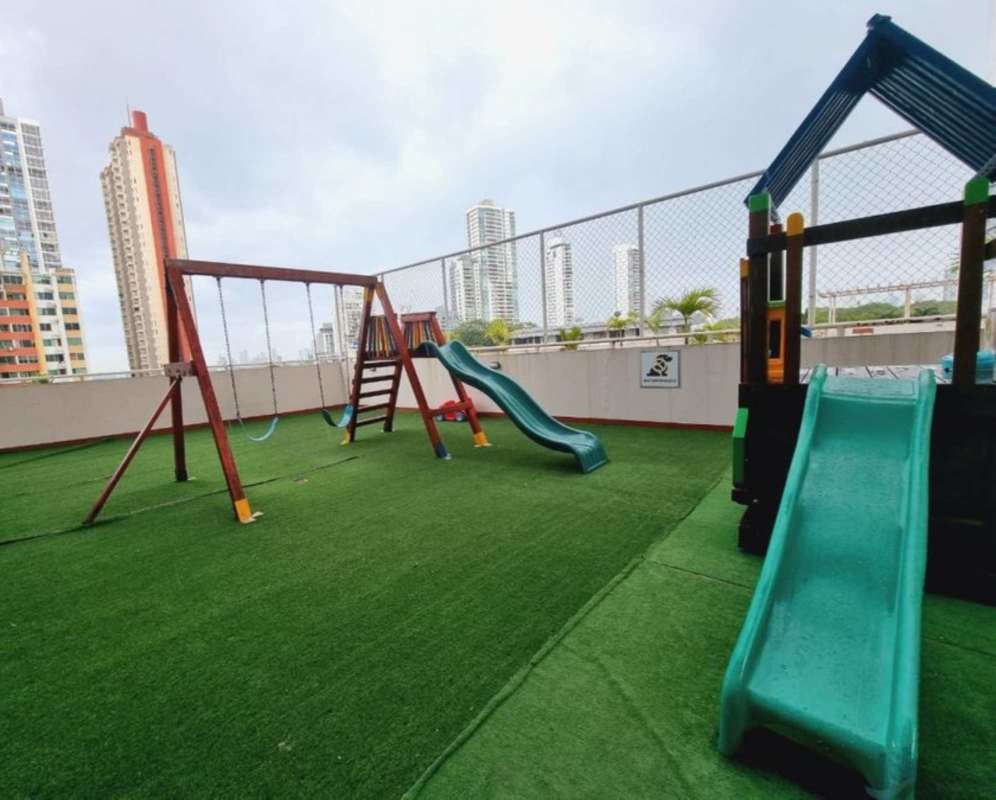 Swimming pool area in PH Sunshine by The Park with deck and plants Panama