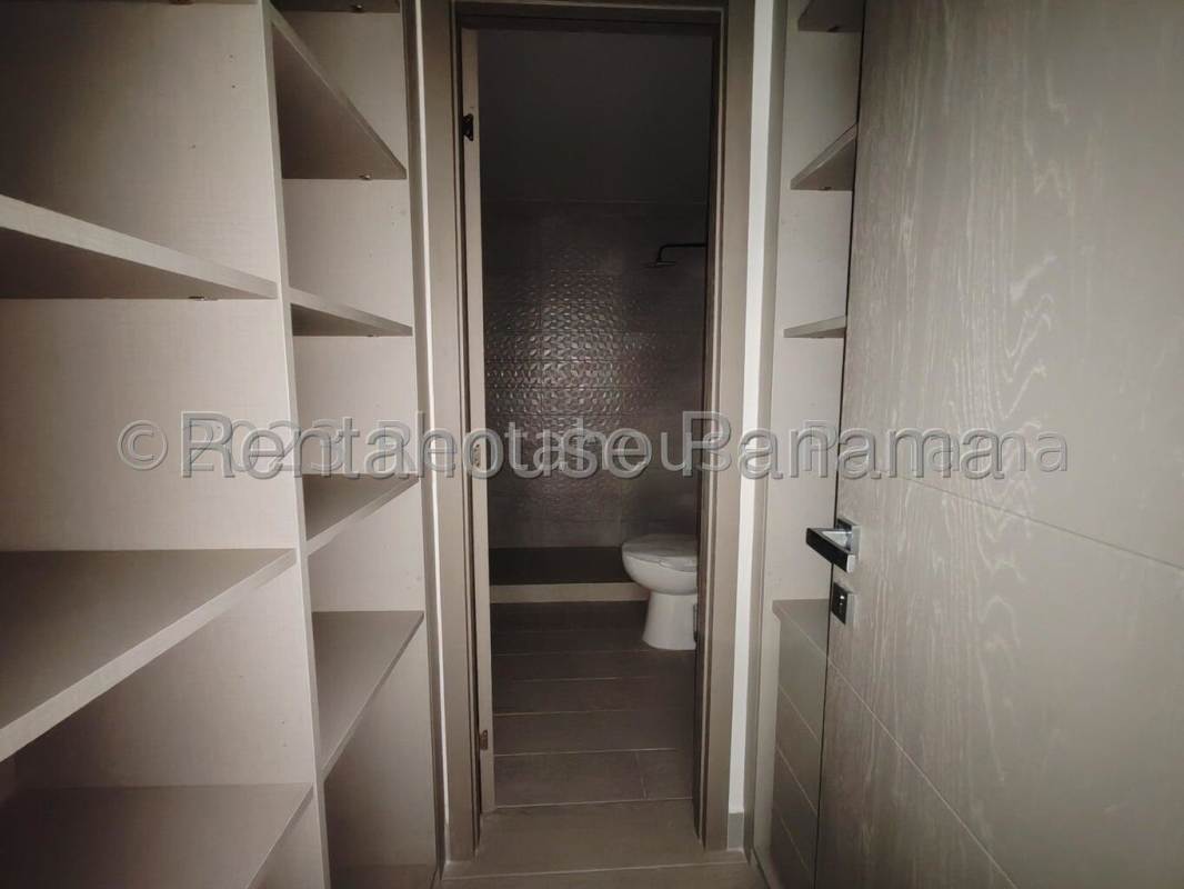 Closet space leading into bathroom with modern tiles PH Smart Park Panama for rent