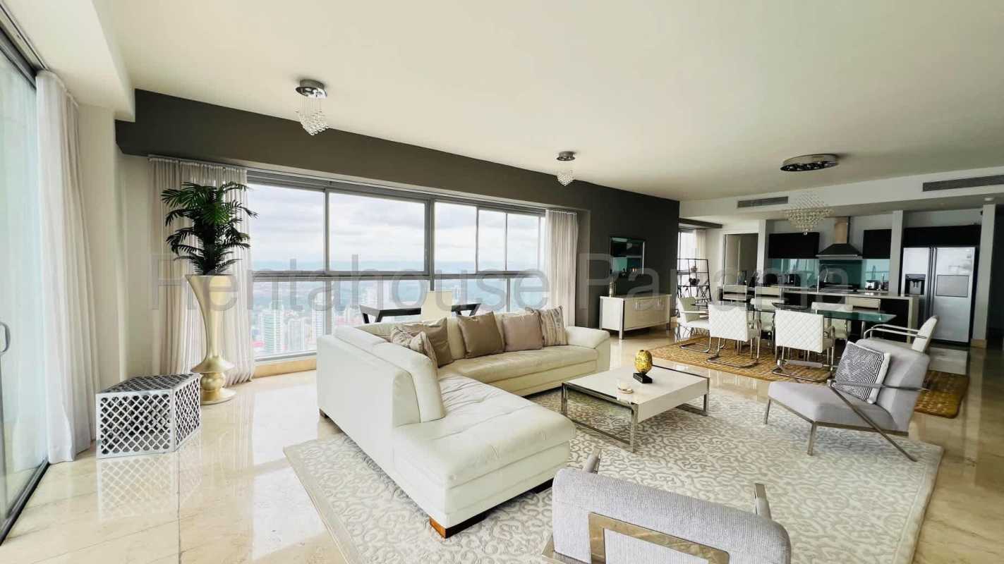 Elegant penthouse dining living space with ocean and city views at PH BICSA Tower Panama