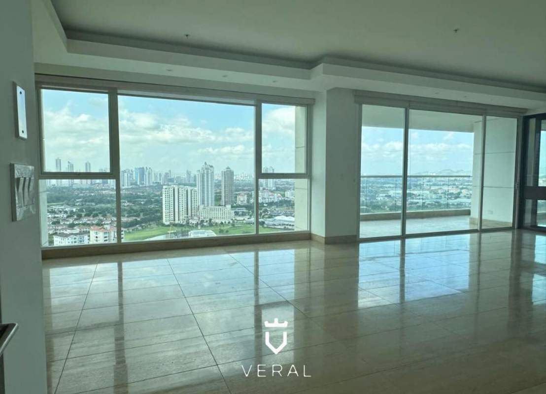 Spacious marble floor living area with floor-to-ceiling windows overlooking Santa Maria Golf Course PH Solana Panama