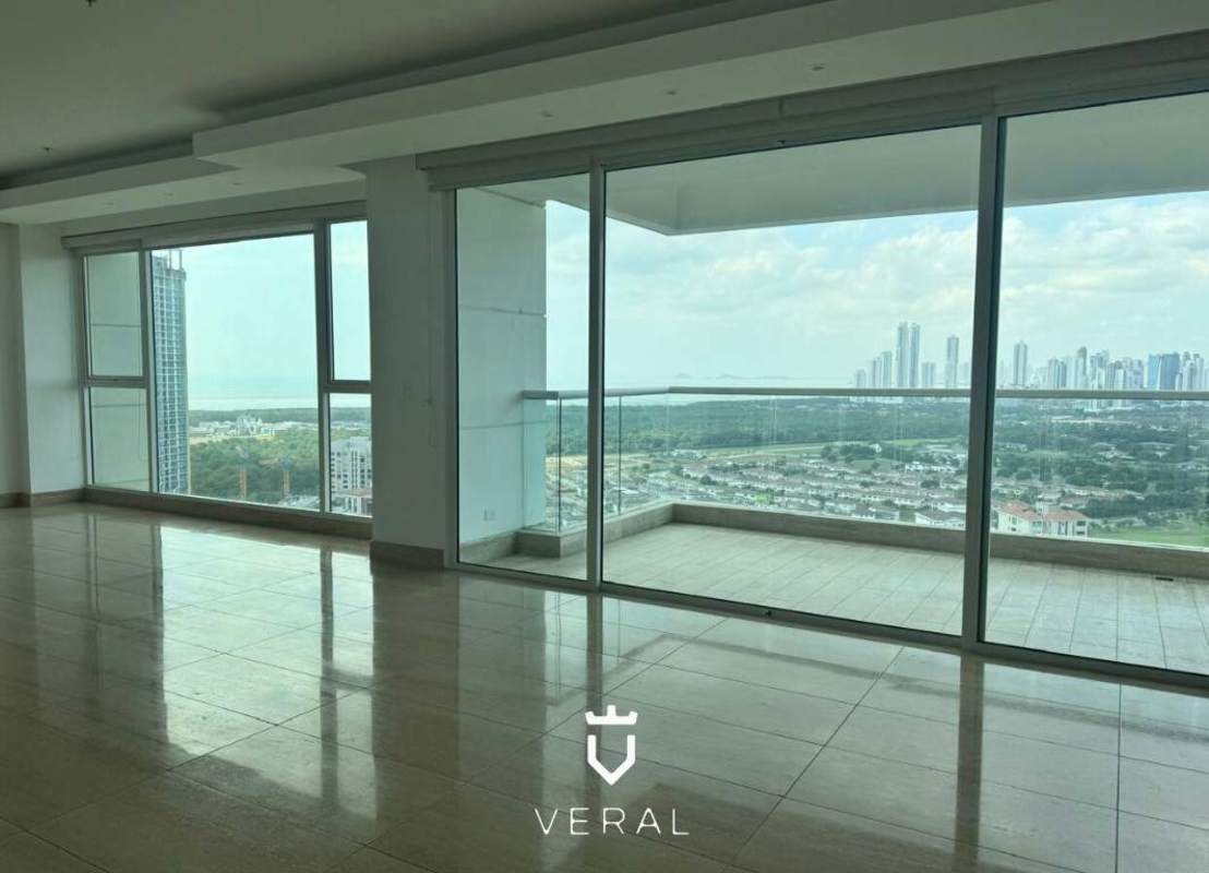 Contemporary kitchen with central island, built-in oven, and panoramic views at PH Solana