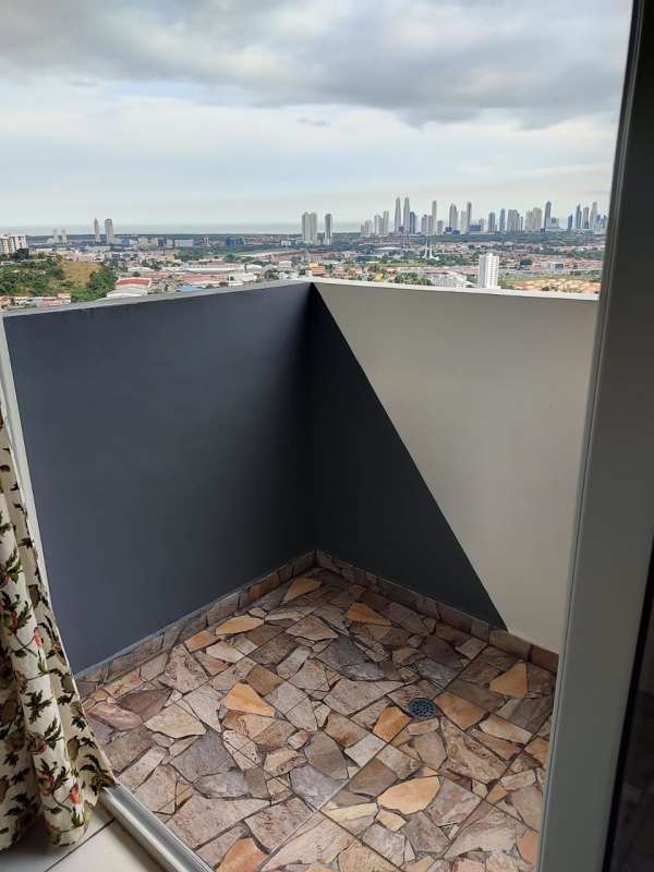 Private balcony overlooking city skyline from apartment for rent in Villa Lucre Panama