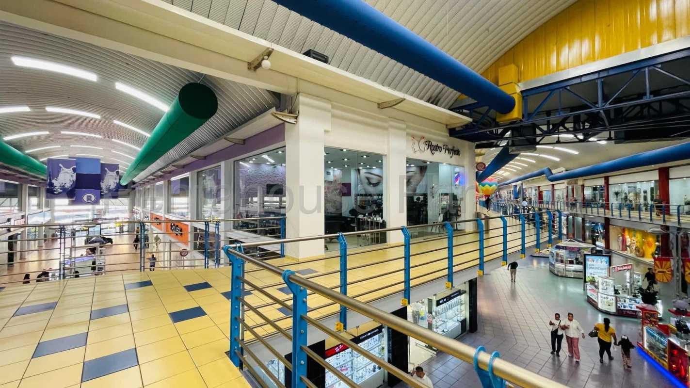 Second level interior view with storefronts for lease Albrook Mall Panama City