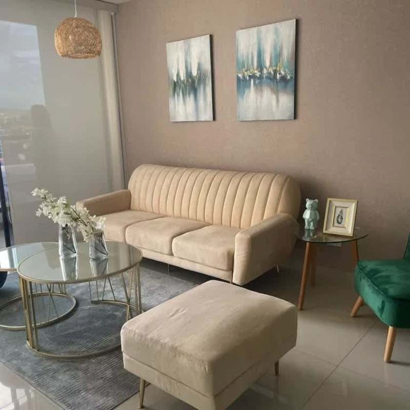 Bedroom with large windows and city skyline view in PH Canvas Parque Lefevre Panama