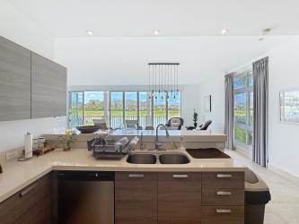 Expansive rooftop terrace panoramic golf course lake views at Ocean Lakes Villas