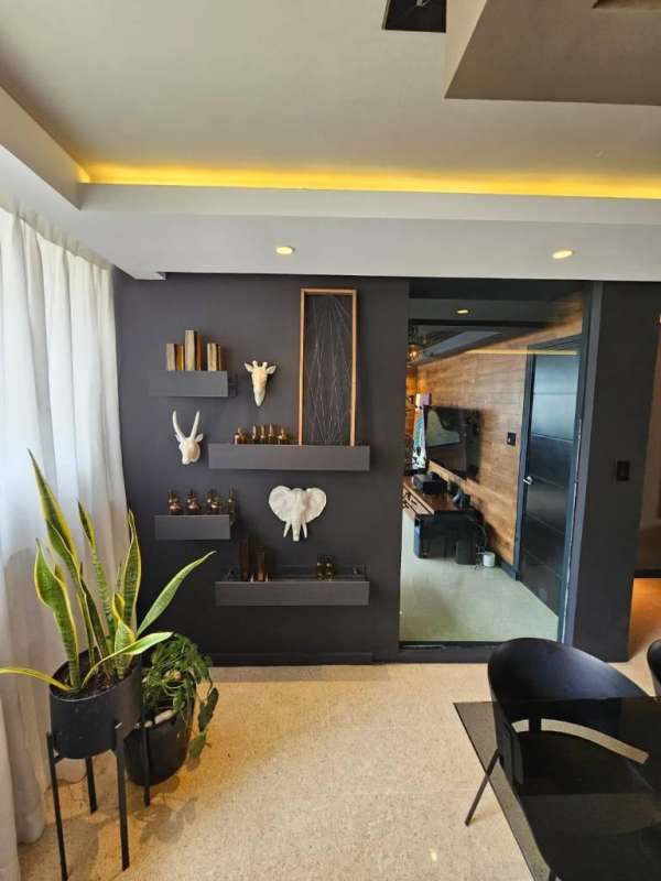 Remodeled modern kitchen with granite counters and appliances at PH La Concha Panama City