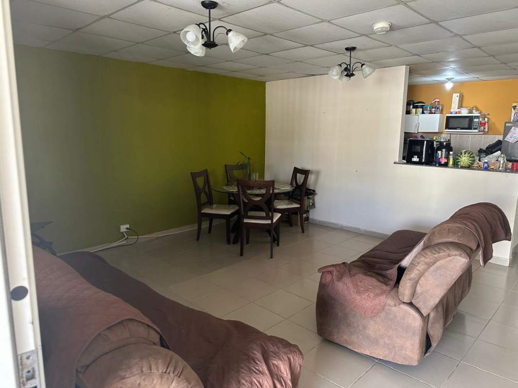 Open plan living dining with tile flooring in Praderas del Norte Tocumen Panama