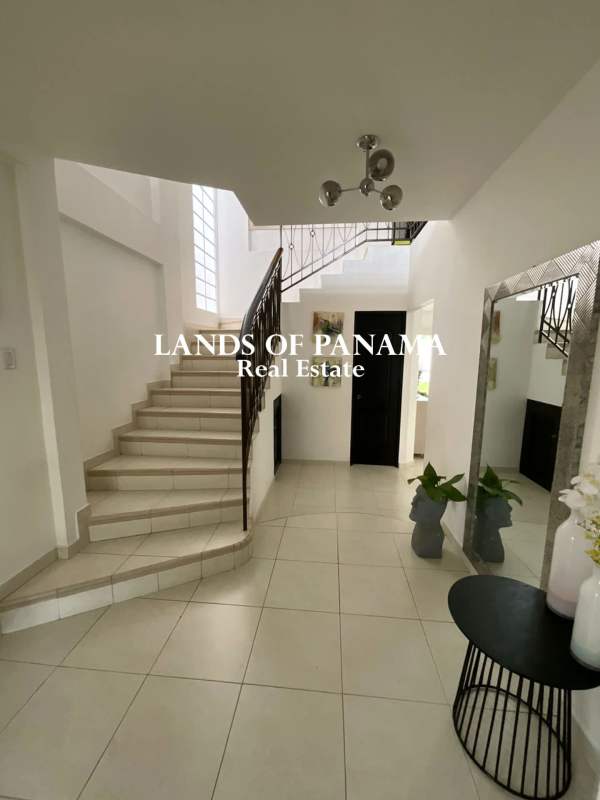 Living and dining area open space with tile floors and modern furnishings in Villa Valencia Costa Sur