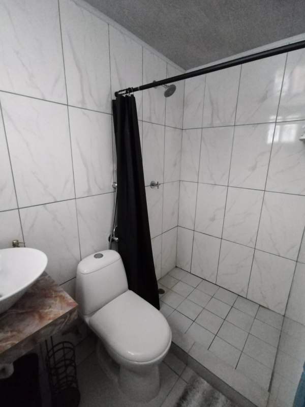 Bedroom with air conditioning, window, closet in La Arboleda del Golf House Panama