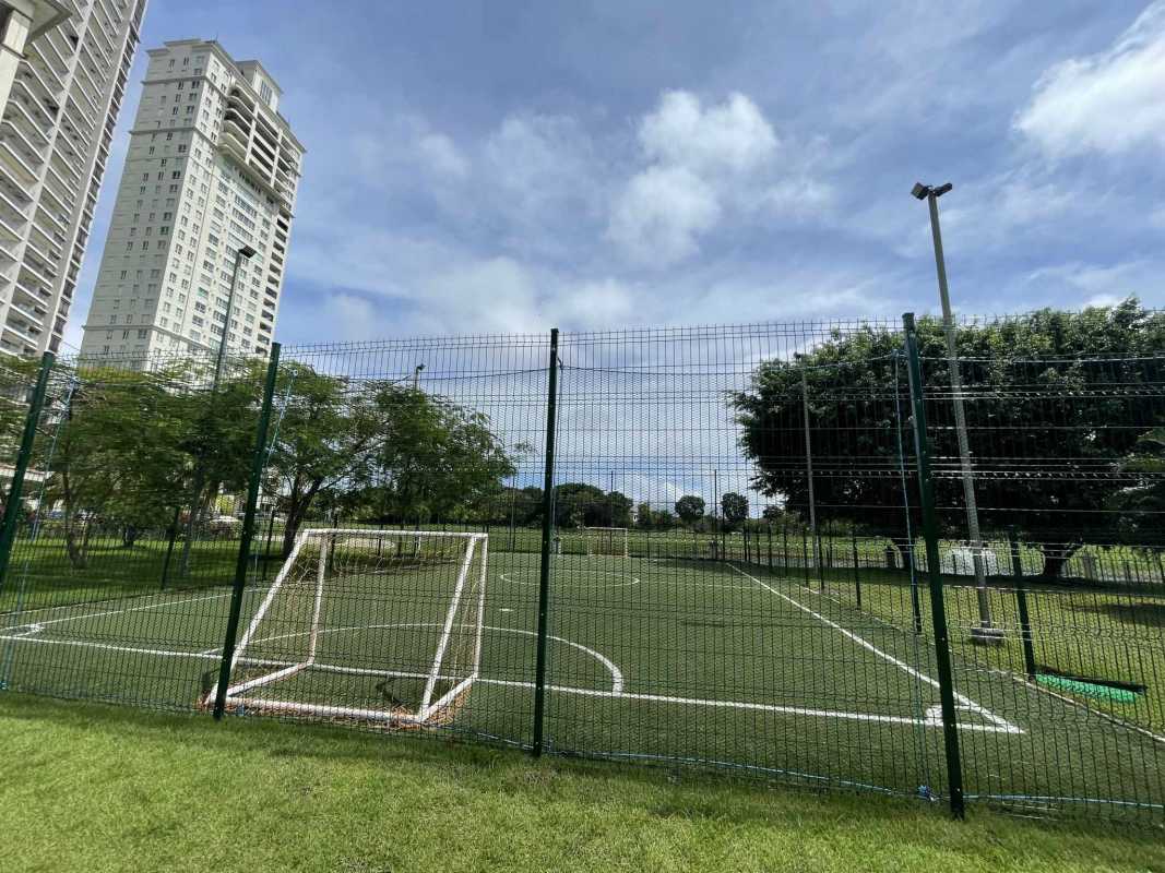 Stylish kitchen with island, built-in appliances, wine cooler at The Reserve Santa Maria Panama City