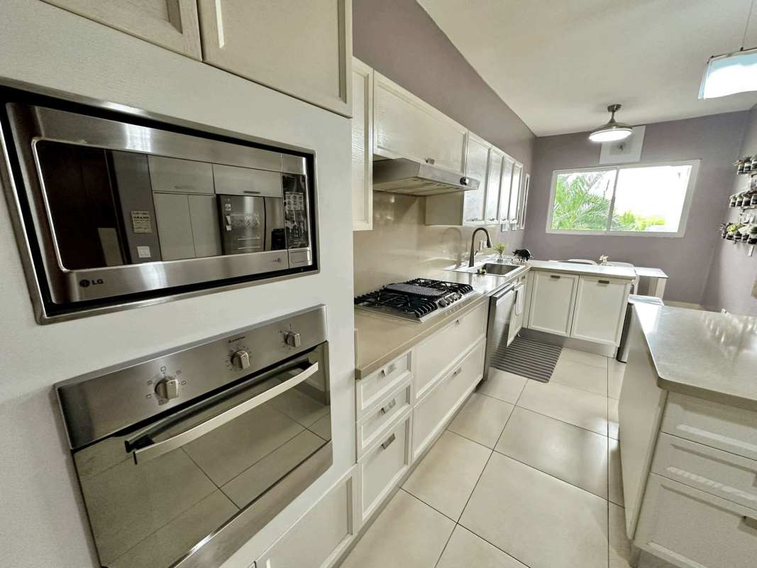 Master bedroom with large window, walk-in closet, marble floors The Reserve Santa Maria Panama