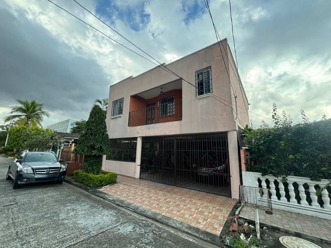 Spacious master bedroom with balcony access, AC, ceiling fan, walk-in closet