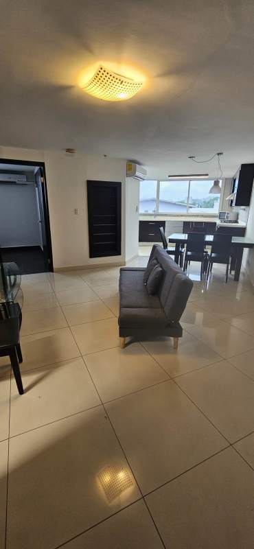 Bathroom with beige and black tiles, bathtub and shower in Jardines de Costa del Este Panama City