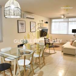 Lush landscaped garden surrounding private pool in Coronado beach home