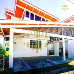 Bright second bedroom with window in beach house Coronado Panama