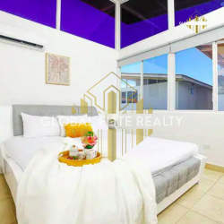 Modern kitchen with contemporary cabinetry in beach house Paradise Point Coronado