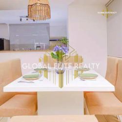 Open concept dining and living room with marble flooring Coronado beach home