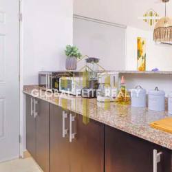 Spacious living area with marble floors and sliding glass doors Paradise Point Coronado