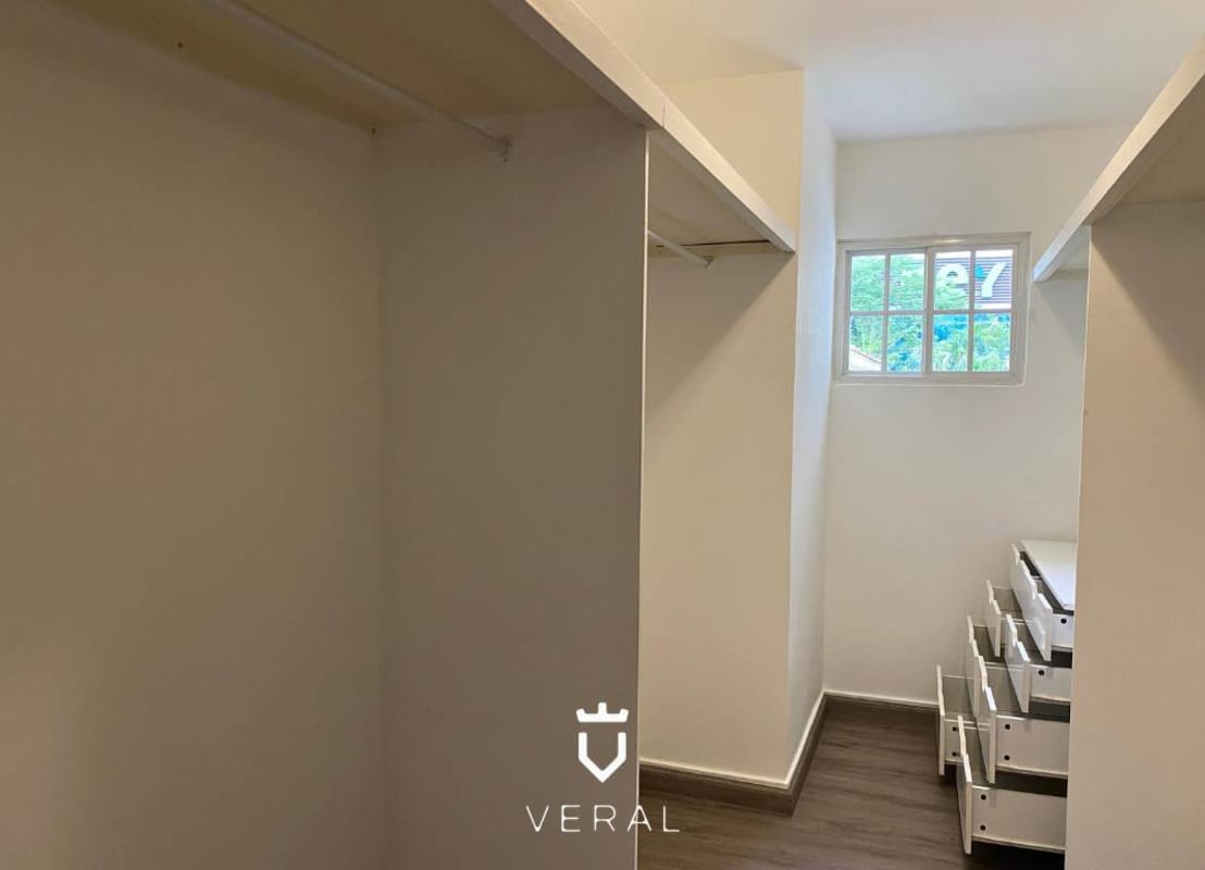 Modern kitchen with granite countertops and stainless steel appliances in house for sale Costa del Este Panama