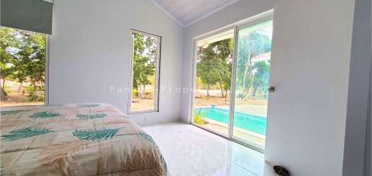 Bright open kitchen and dining area with modern cabinetry Punta Mala Panama