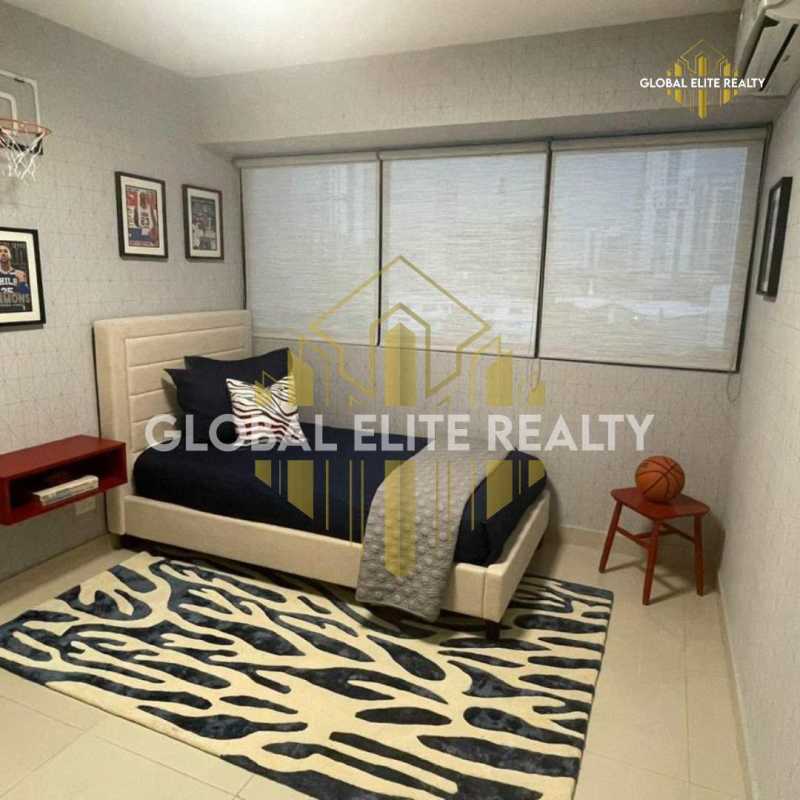 Bedroom with large window and skyline view PH Balboa Bay Panama