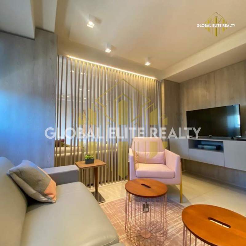 Modern bedroom with large window, city view PH Balboa Bay Panama apartment