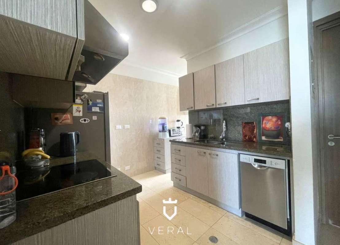 Luxury kitchen with granite countertops, stainless appliances at PH Santorini Panama