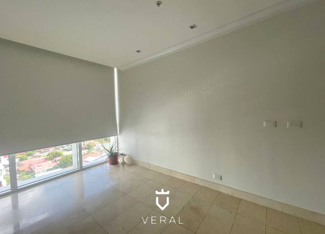 Spacious master bedroom with floor-to-ceiling balcony and ocean view PH Santorini Panama