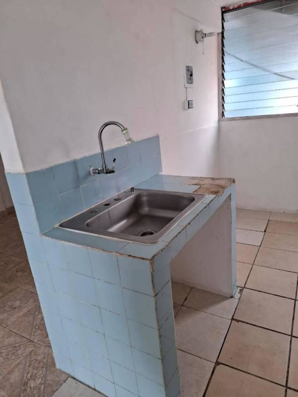 Empty bedroom with louvered window tile flooring PH La Colina Condado del Rey Panama