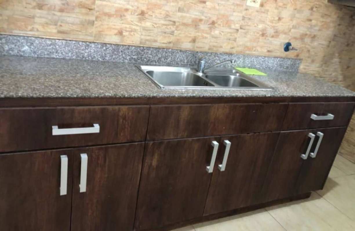 Kitchen featuring granite countertop with double stainless sink PH Terraza del Rey Condado del Rey Panama