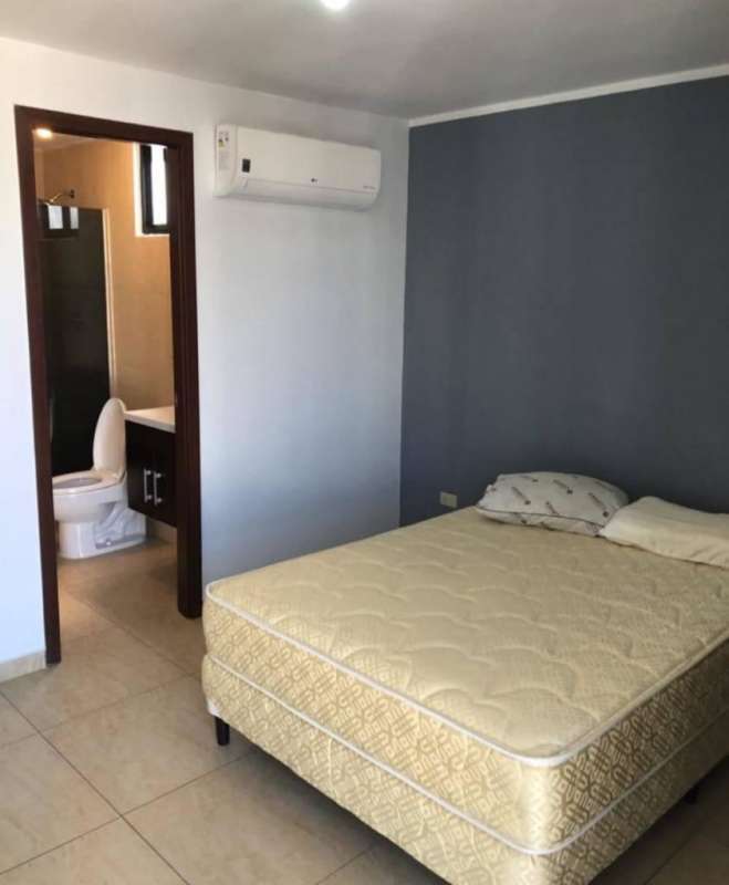 Bedroom featuring ensuite bathroom, split air conditioning, tiled floor in PH Terraza del Rey Condado del Rey Panama