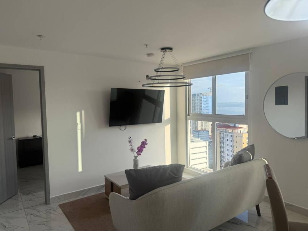 Modern apartment open-plan living dining with balcony and city views PH El Botánico Bella Vista Panama