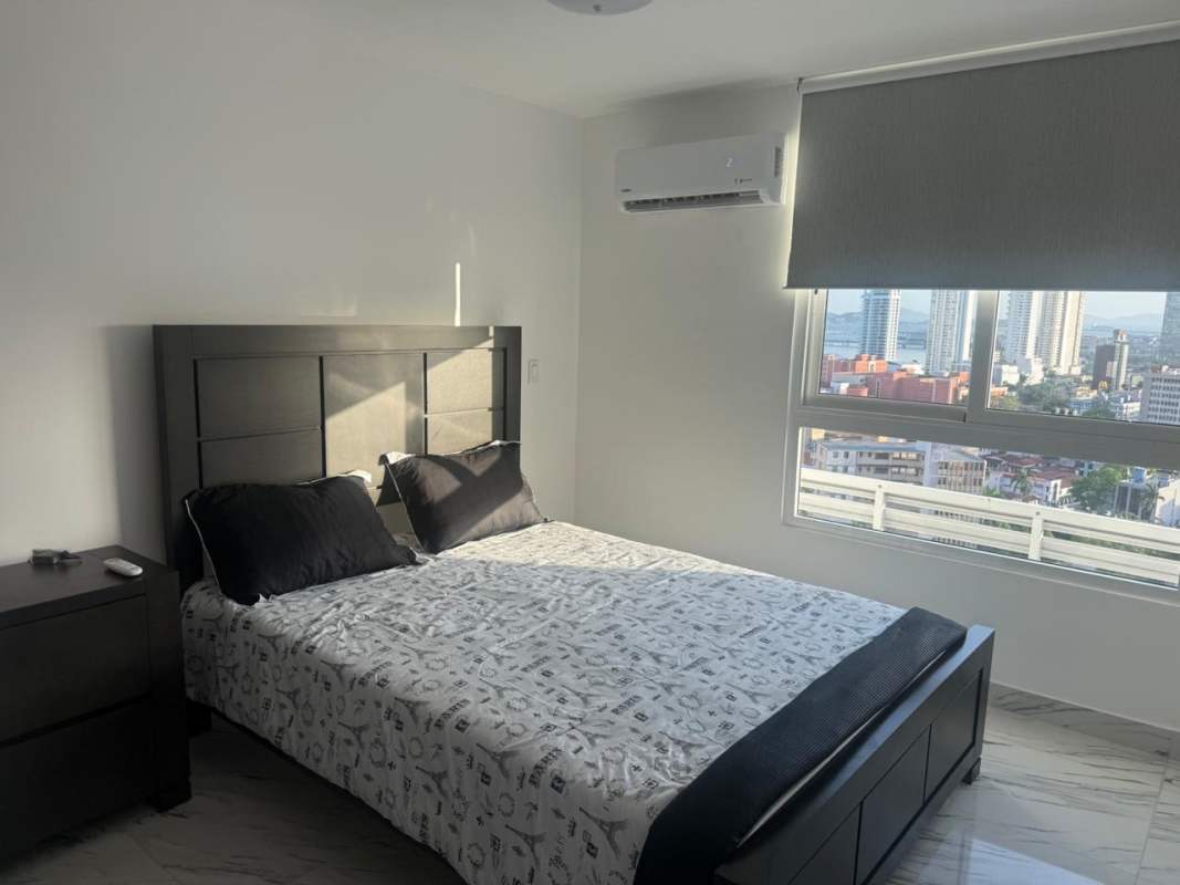 Modern open living dining area with panoramic window city view PH El Botánico Panama