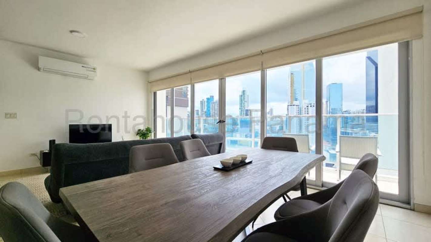 Open kitchen with granite countertop stainless steel appliances in PH BICSA Financial Center Panama