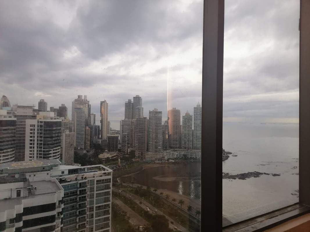 Stunning corporate office city and ocean backdrop in PH BICSA Tower Panama City's financial district