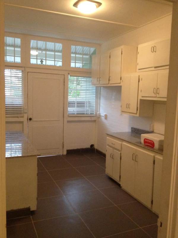 Compact modern bathroom with glass vessel sink and shower Ancón Panama house rental