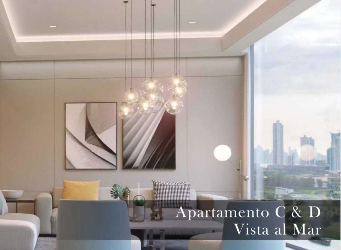 Elegant infinity rooftop pool with sun loungers and panoramic ocean views at The Ivy Santa María Panama City