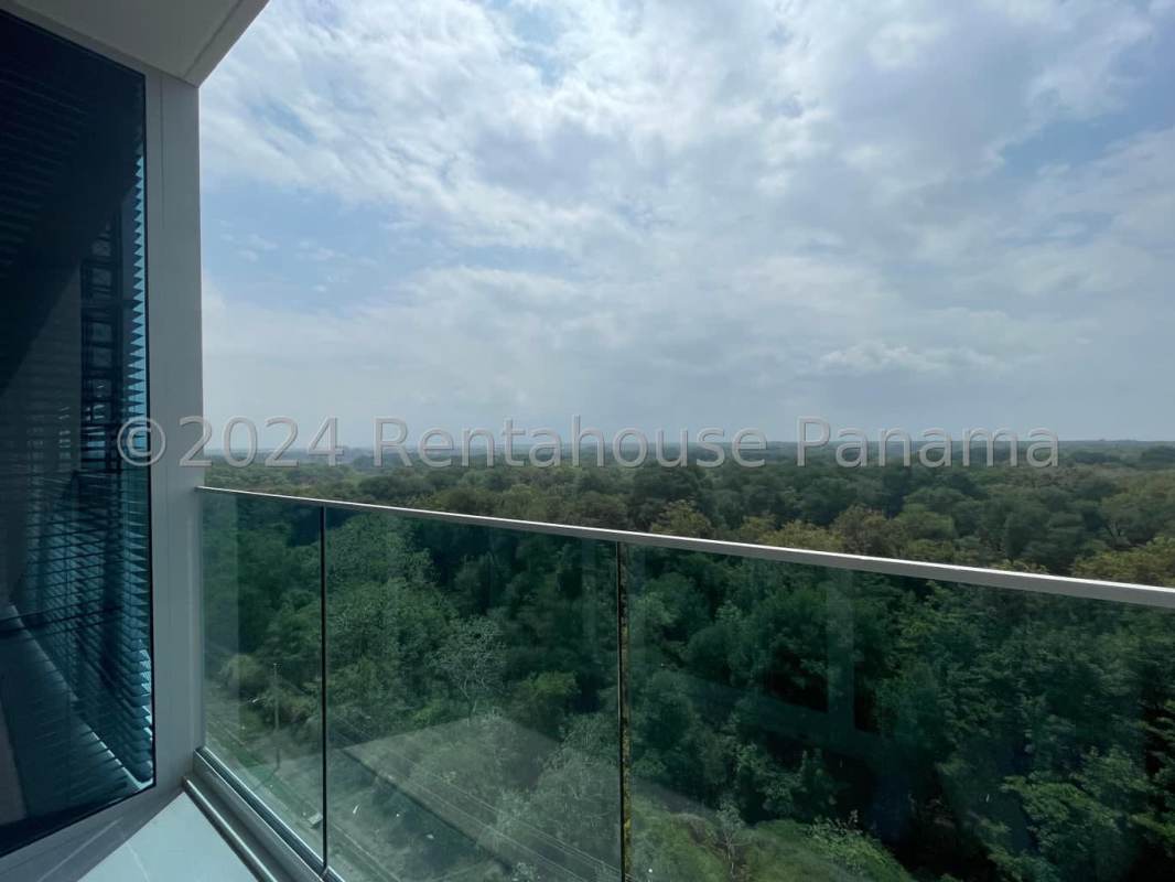 Designer kitchen with modern cabinetry, granite countertops, and city views in The Ivy Santa María Panama