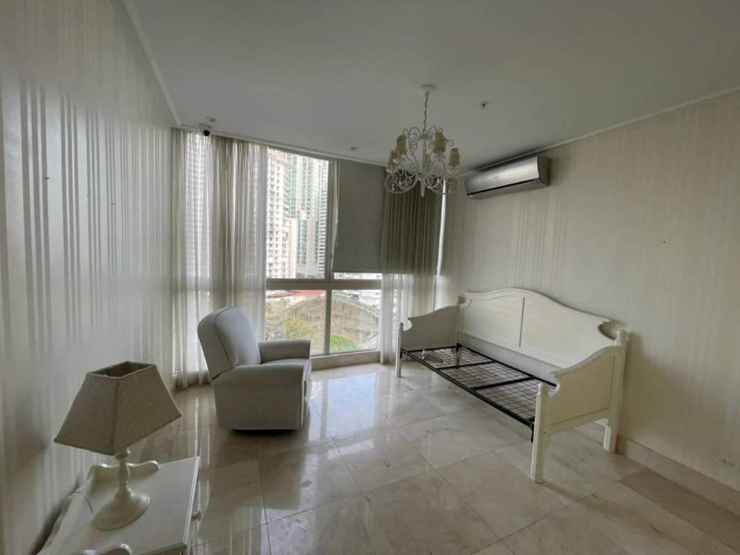 Contemporary living room with large windows and white furniture PH D1 Punta Paitilla Panama
